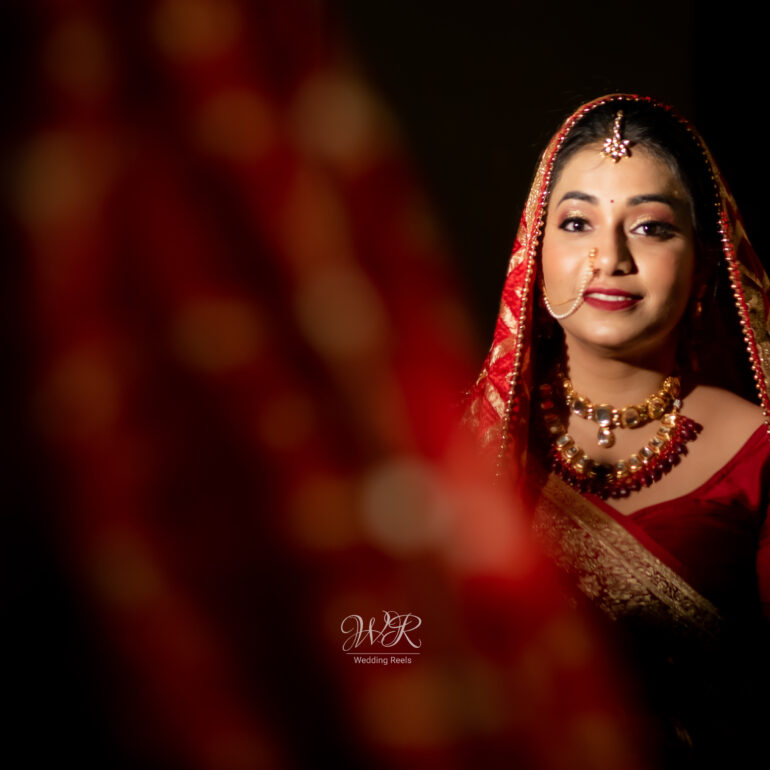 Premium Photo | A bride poses for a photo in her traditional bridal gown.
